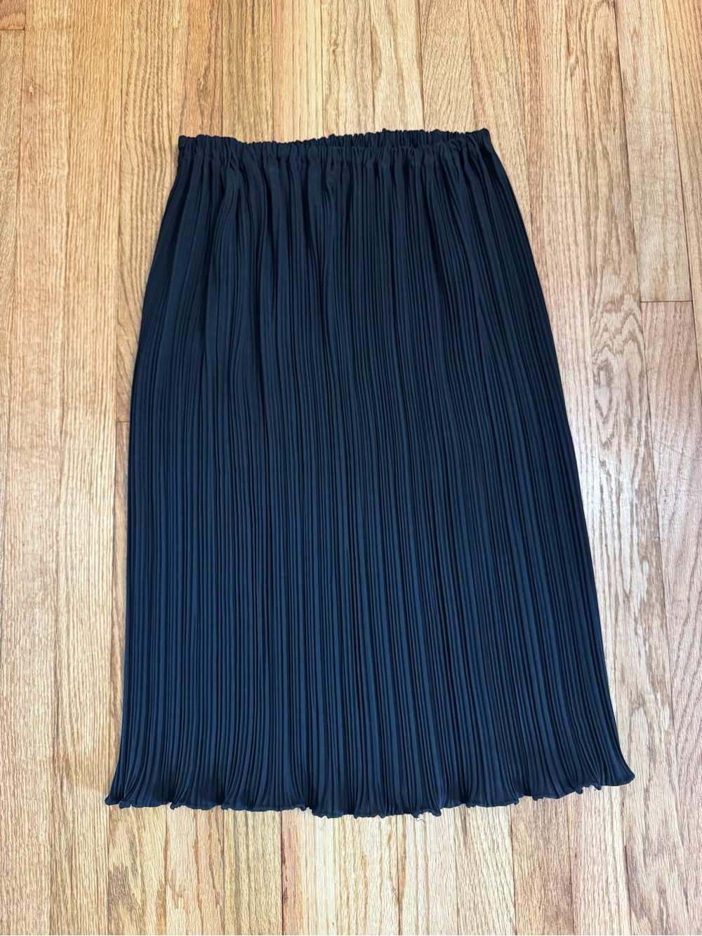 Black pleated midi skirt